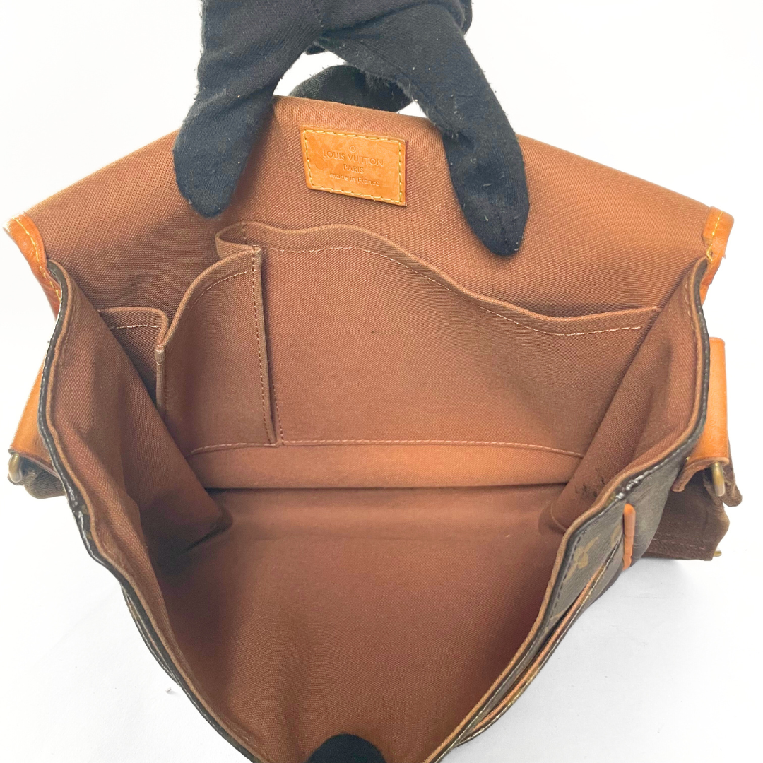 Louis Vuitton Bosphore Messenger in Monogram Canvas.