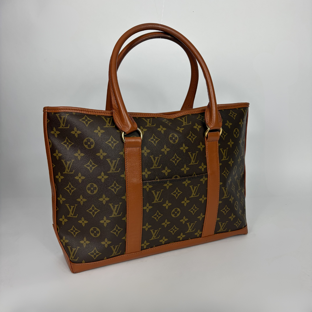 Louis Vuitton Sac Weekend PM Monogram Canvas on a white background