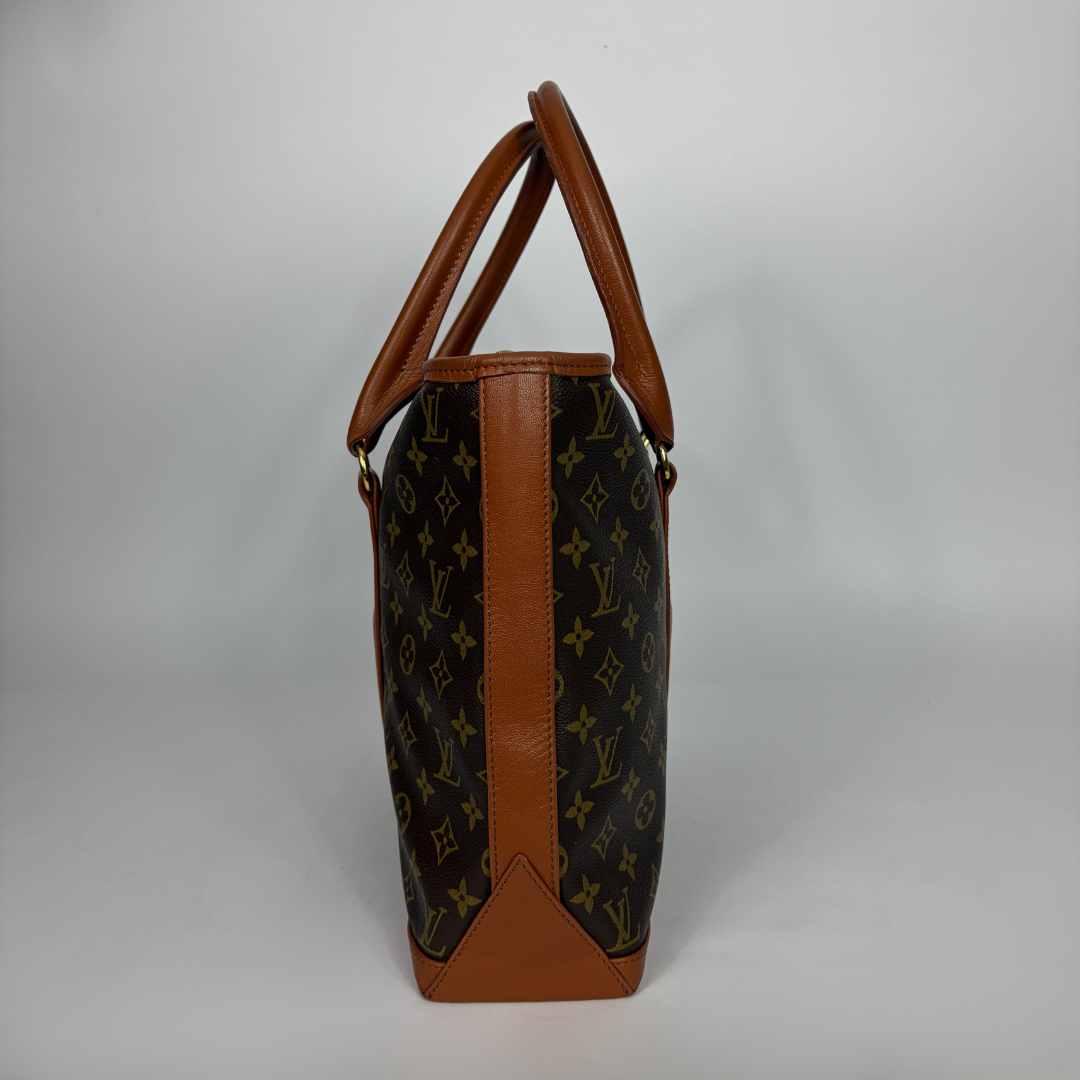 Louis Vuitton Sac Weekend PM Monogram Canvas on a white background