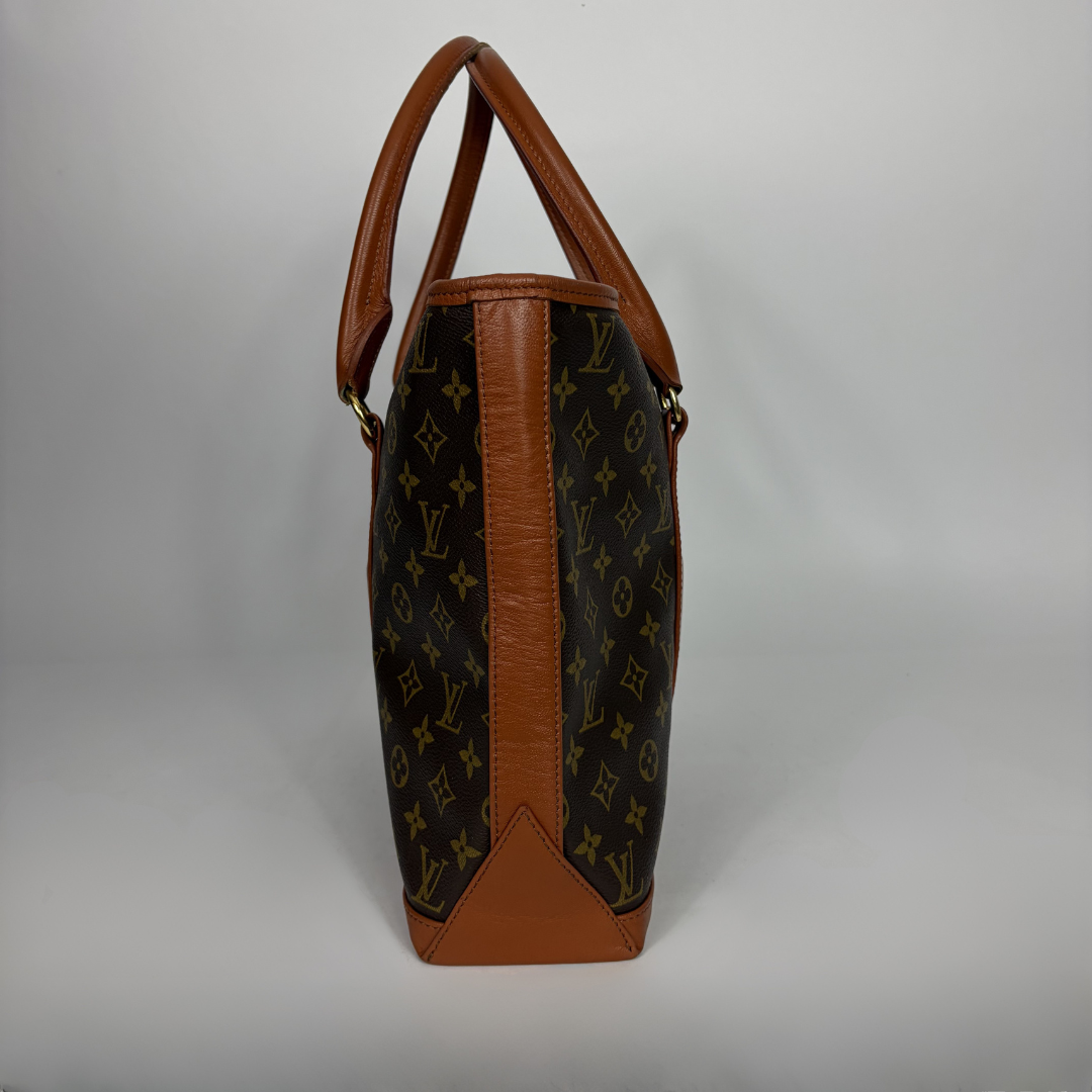 Louis Vuitton Sac Weekend PM Monogram Canvas on a white background