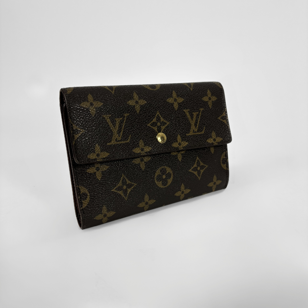 Louis Vuitton International Wallet Medium on a white background