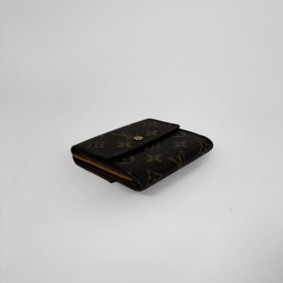 Louis Vuitton Druk Wallet on a white background