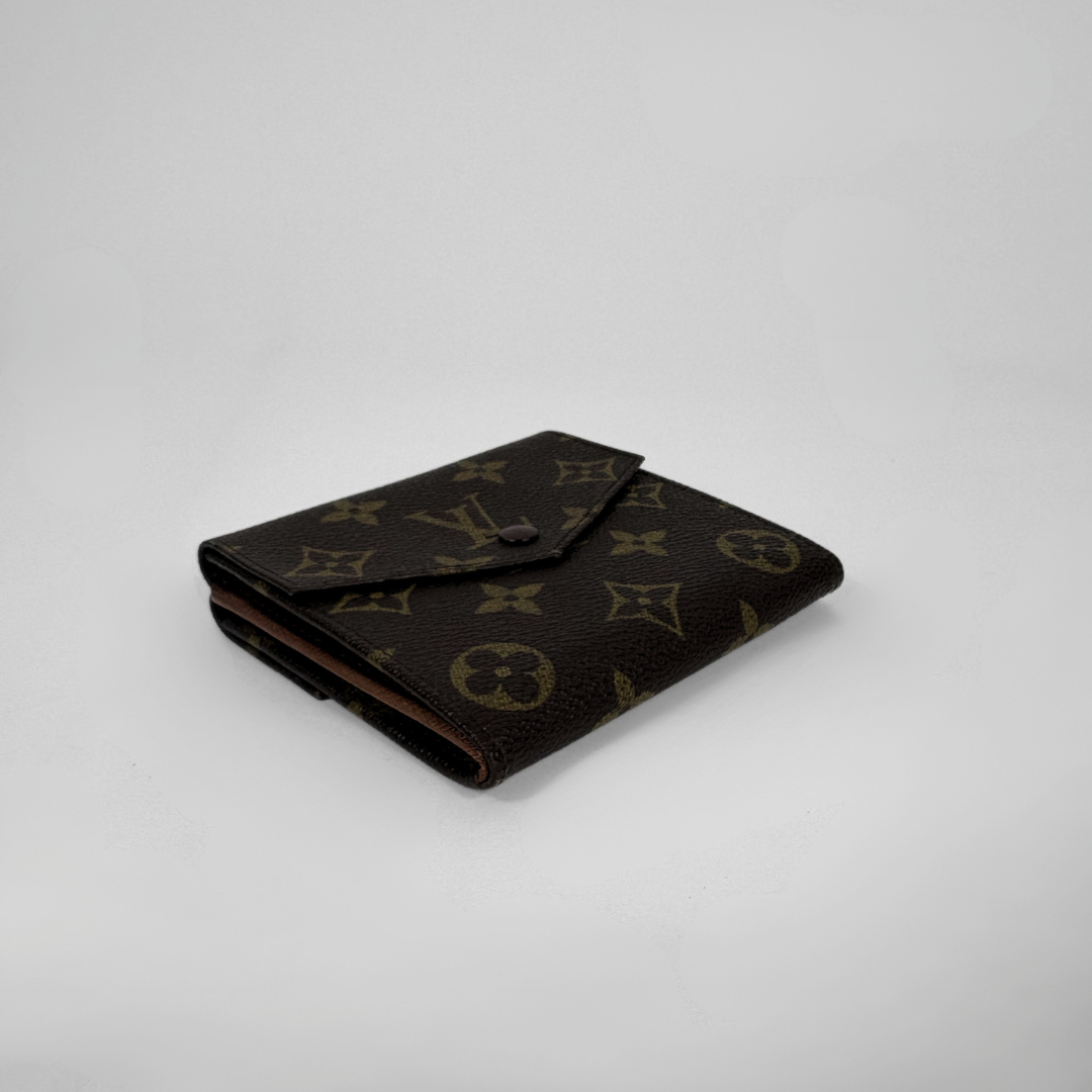 Louis Vuitton Druk Wallet on white background