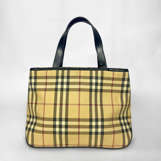 Plaid tote bag with black handles on a white background