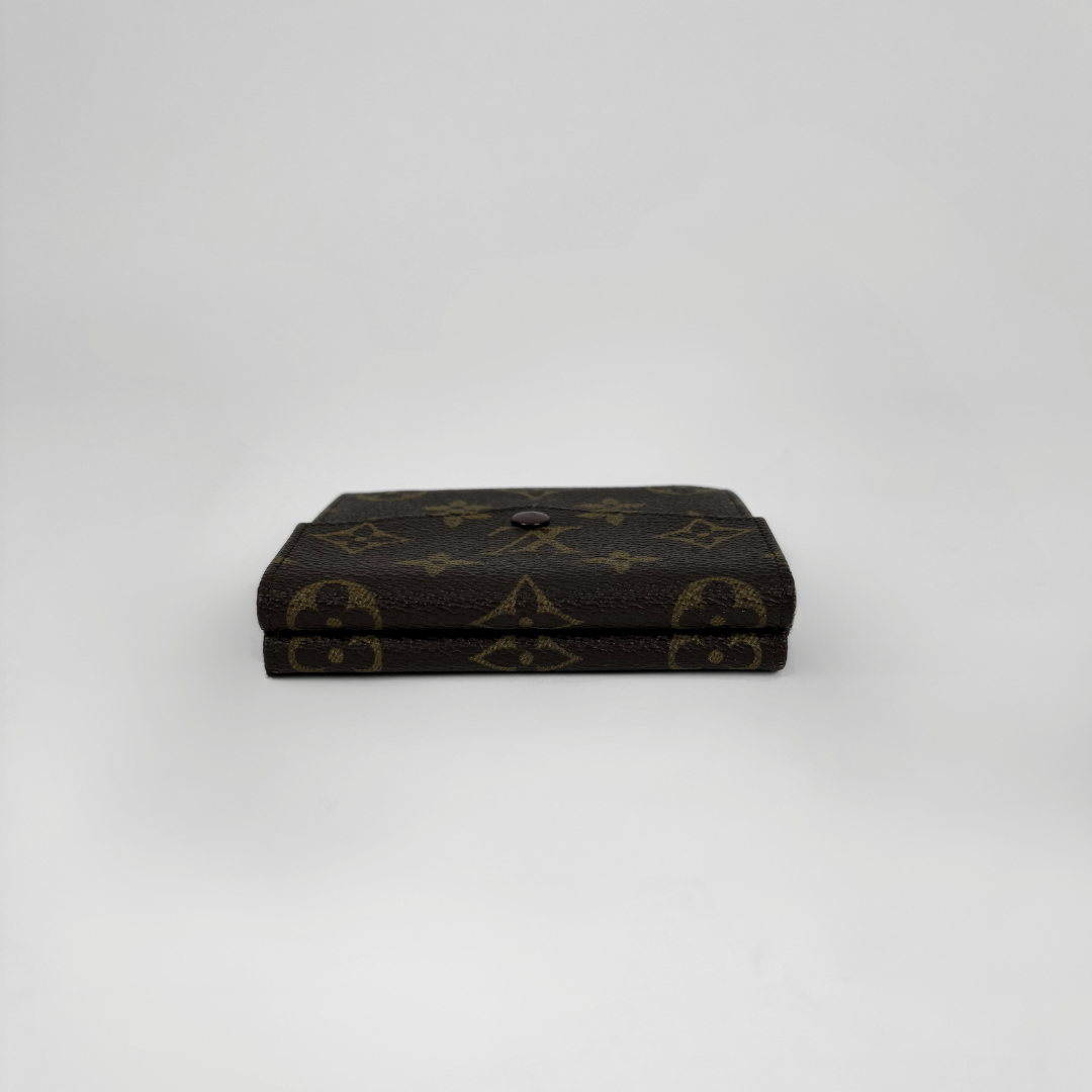 Louis Vuitton Druk Wallet on white background