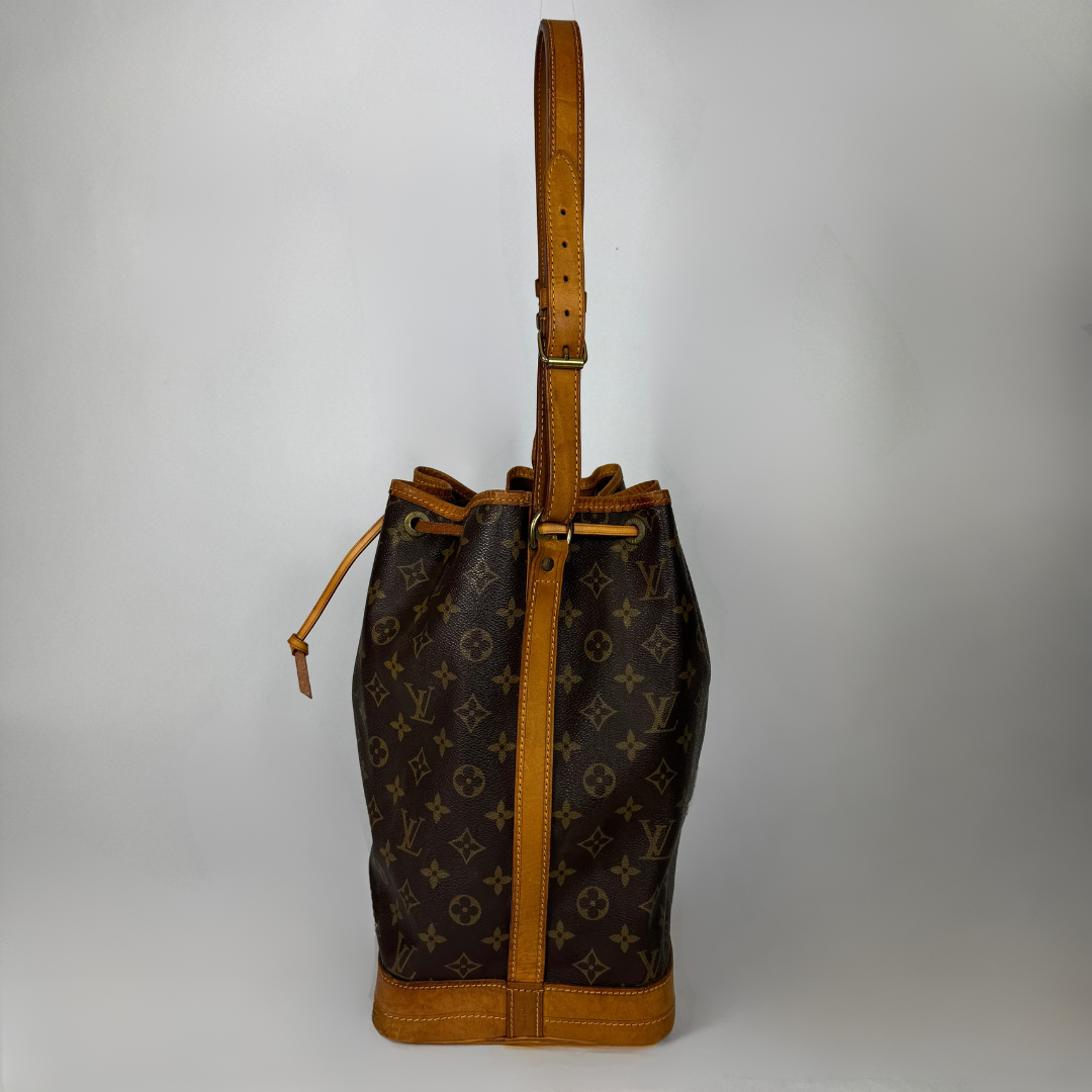 Louis Vuitton Petit Noe Monogram Canvas on a white background