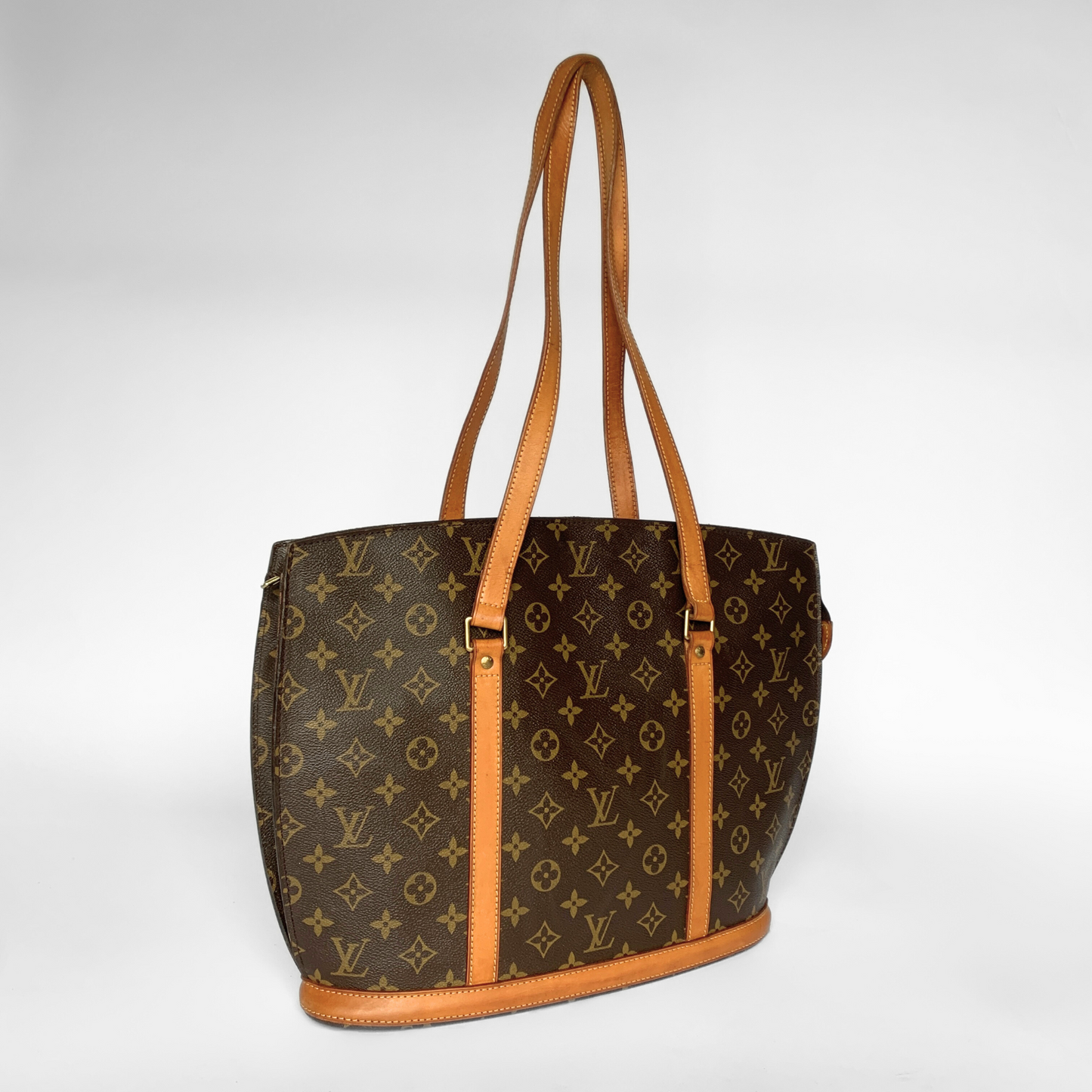 Louis Vuitton Louis Vuitton Babylon Monogram Canvas - Shoulder bags - Etoile Luxury Vintage