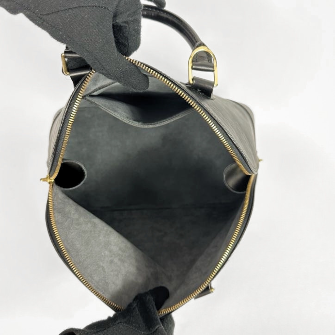 Louis Vuitton Alma in Black Epi Leather on a white