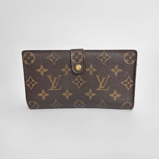 Louis Vuitton wallet with monogram pattern on a white background