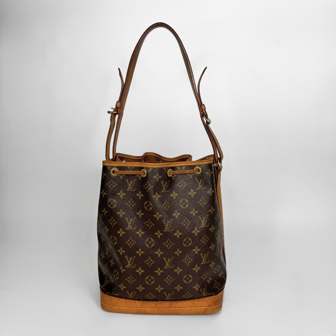 Louis Vuitton Petit Noe Monogram Canvas on a white background