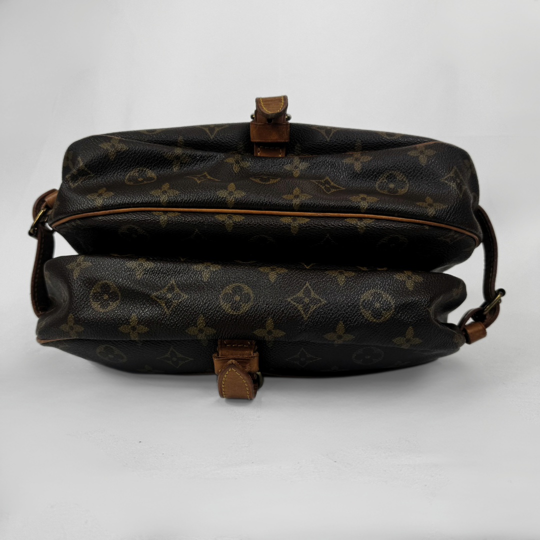 Two Louis Vuitton monogram canvas shoulder bags stacked vertically on a light gray background.