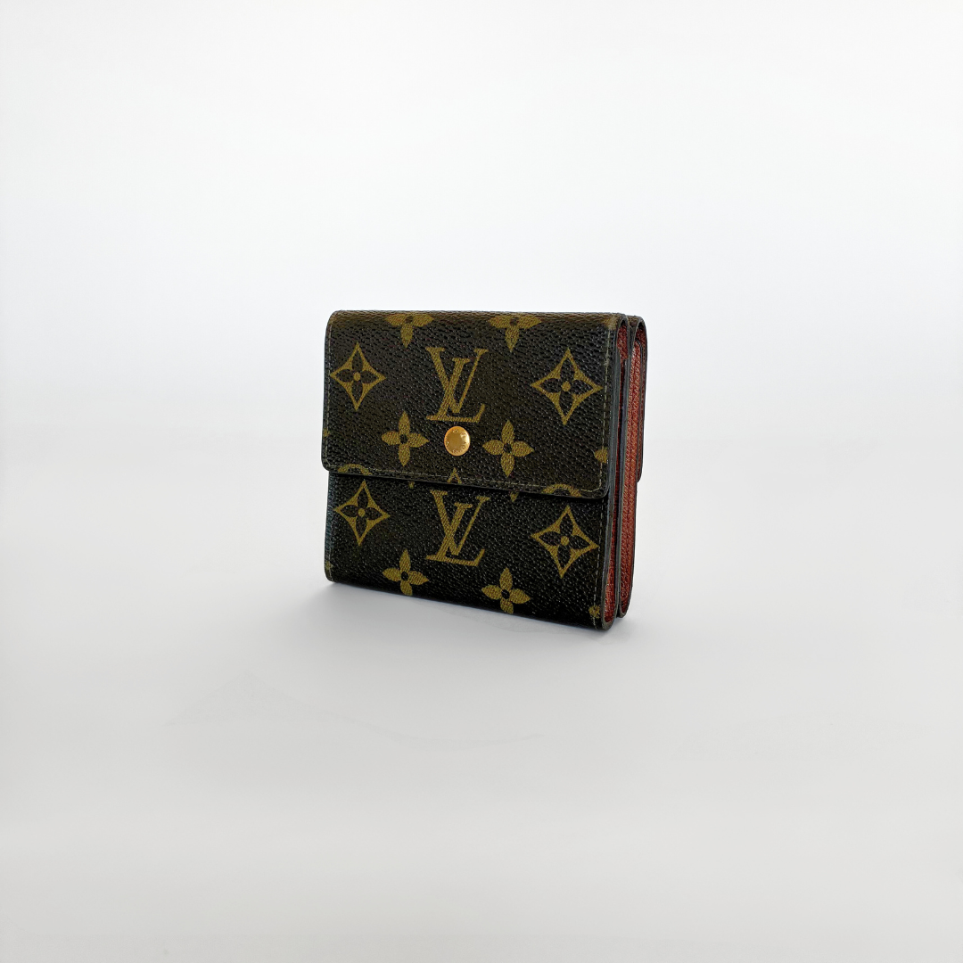Louis Vuitton wallet with monogram pattern on a white background