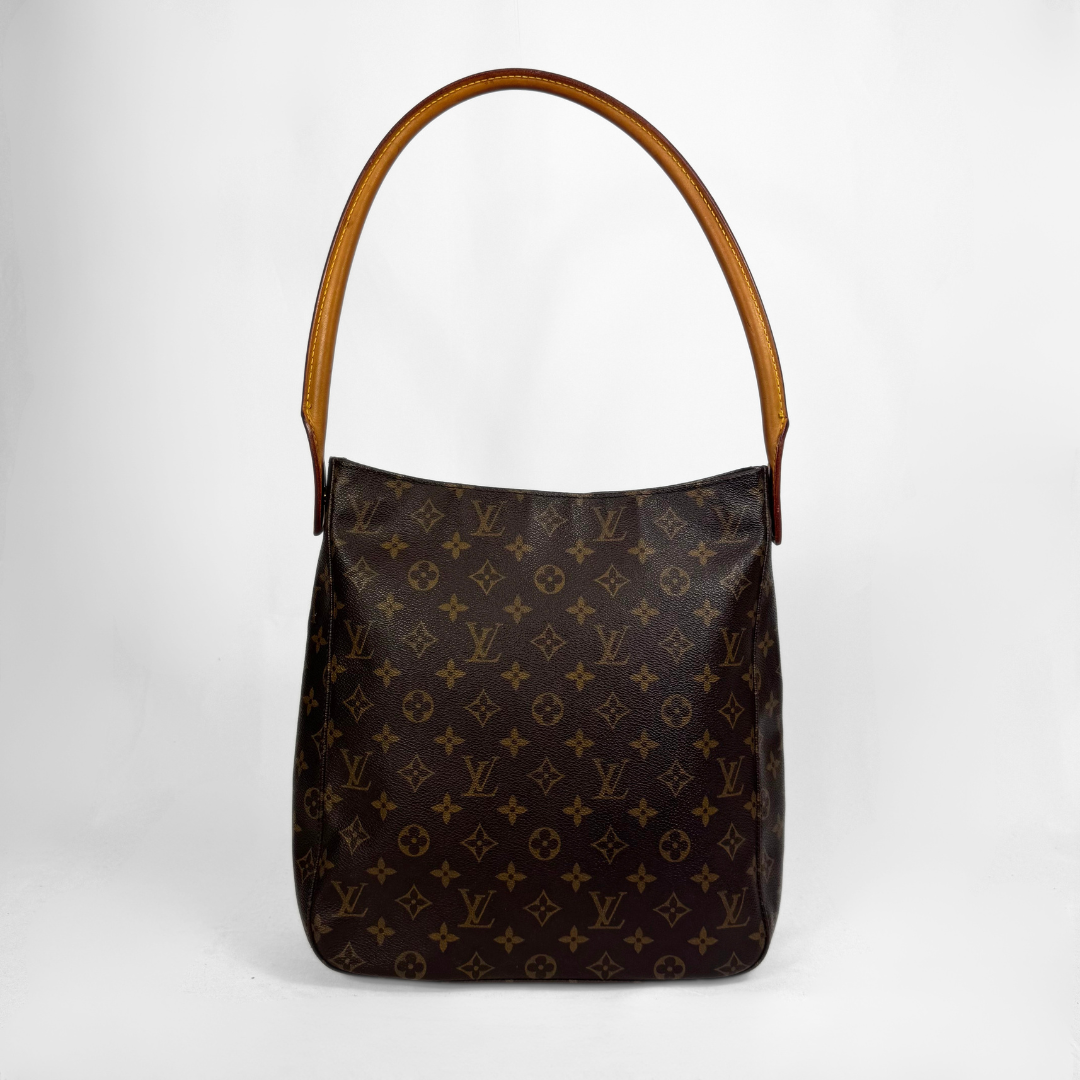 A Louis Vuitton monogram canvas shoulder bag with a brown leather handle, shown against a plain light gray background.