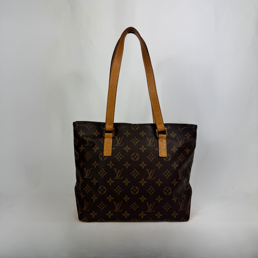 A Louis Vuitton monogram canvas tote bag with tan leather shoulder straps, photographed against a plain light gray background.