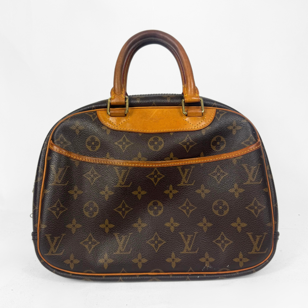 A Louis Vuitton monogram canvas handbag with brown leather handles and trim, photographed against a plain white background.