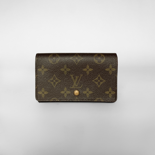Louis Vuitton wallet with monogram pattern on a white background
