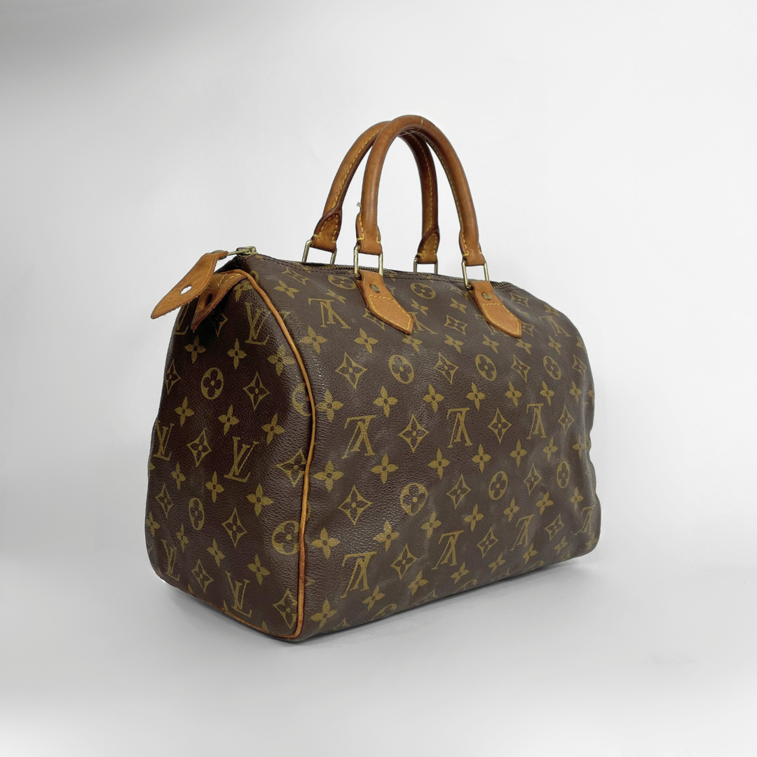 Louis Vuitton Speedy 30 in a white background. 