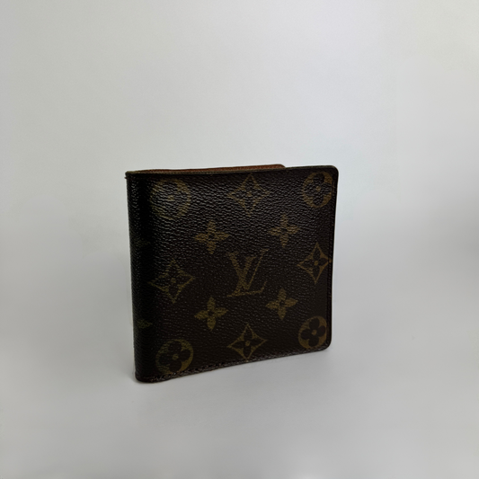 Louis Vuitton Flap Wallet on a white background