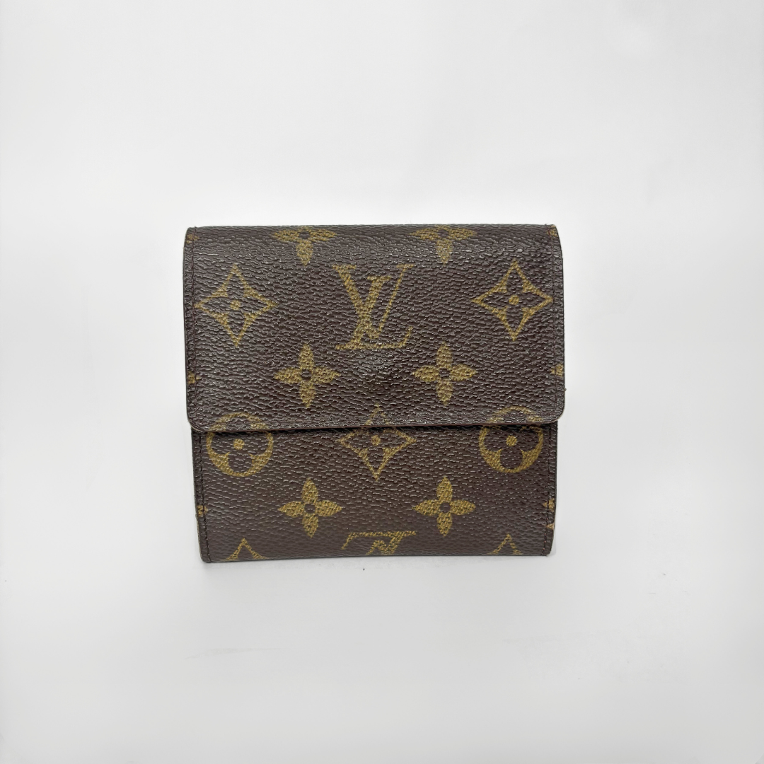 Brown wallet with gold monogram pattern on a white background