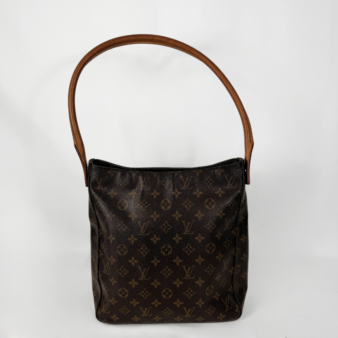 A Louis Vuitton monogram canvas shoulder bag with a brown leather handle, photographed against a plain white background.
