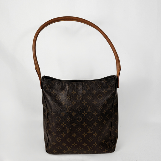 A Louis Vuitton monogram canvas shoulder bag with a brown leather handle, photographed against a plain white background.