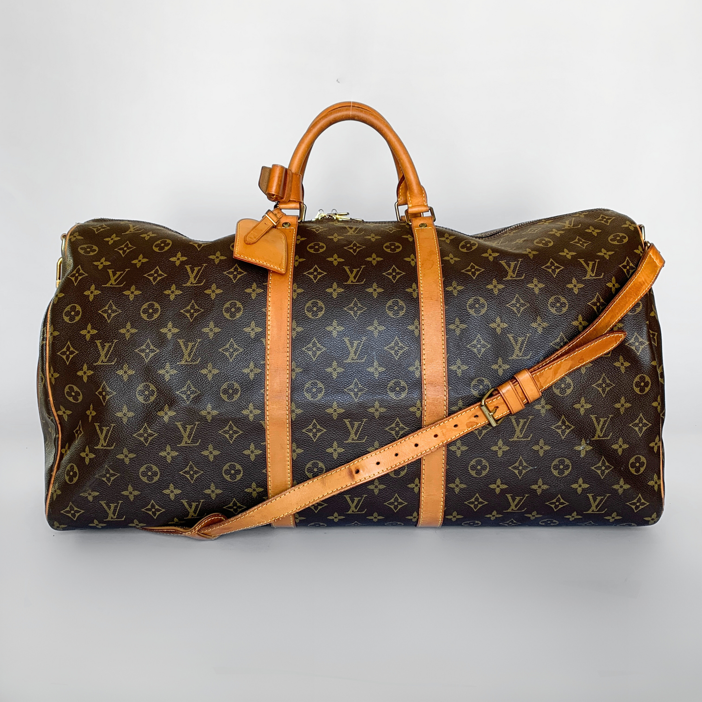 Louis Vuitton Louis Vuitton Keepall 60 Bandouli&egrave;re Monogram Canvas - Handbags - Etoile Luxury Vintage