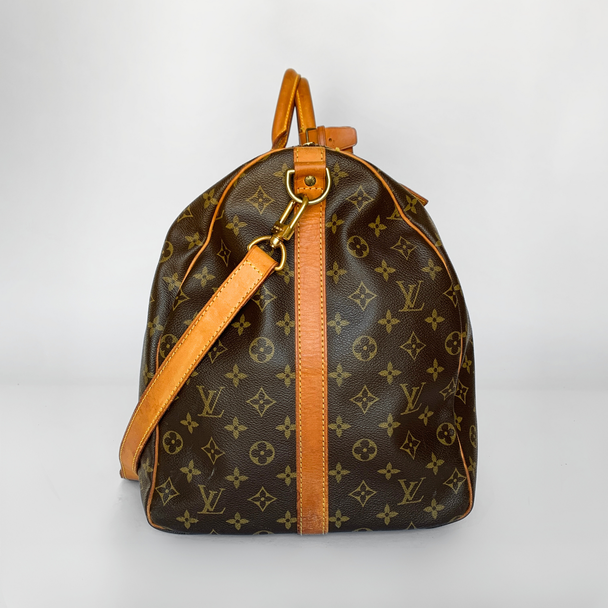 Louis Vuitton Louis Vuitton Keepall 60 Bandouli&egrave;re Monogram Canvas - Handbags - Etoile Luxury Vintage