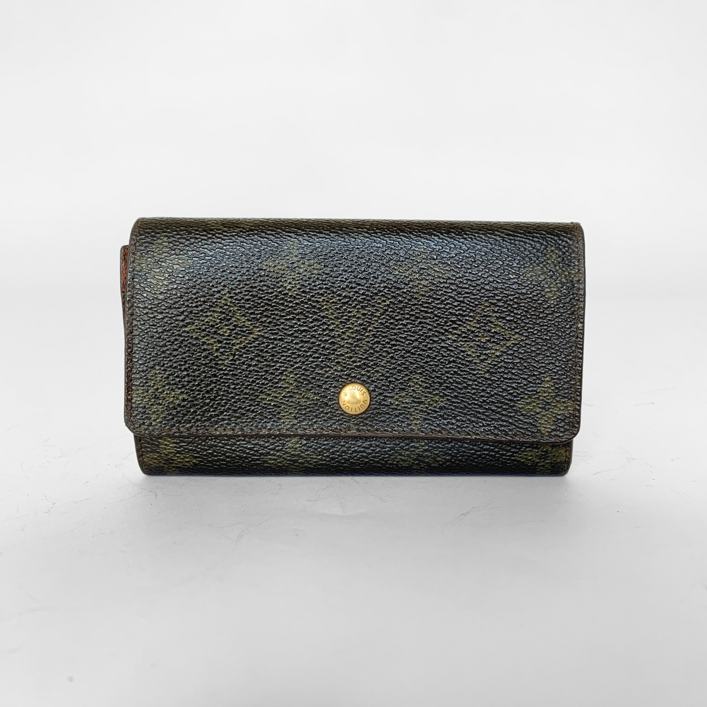 Black leather wallet with a gold button on a white background