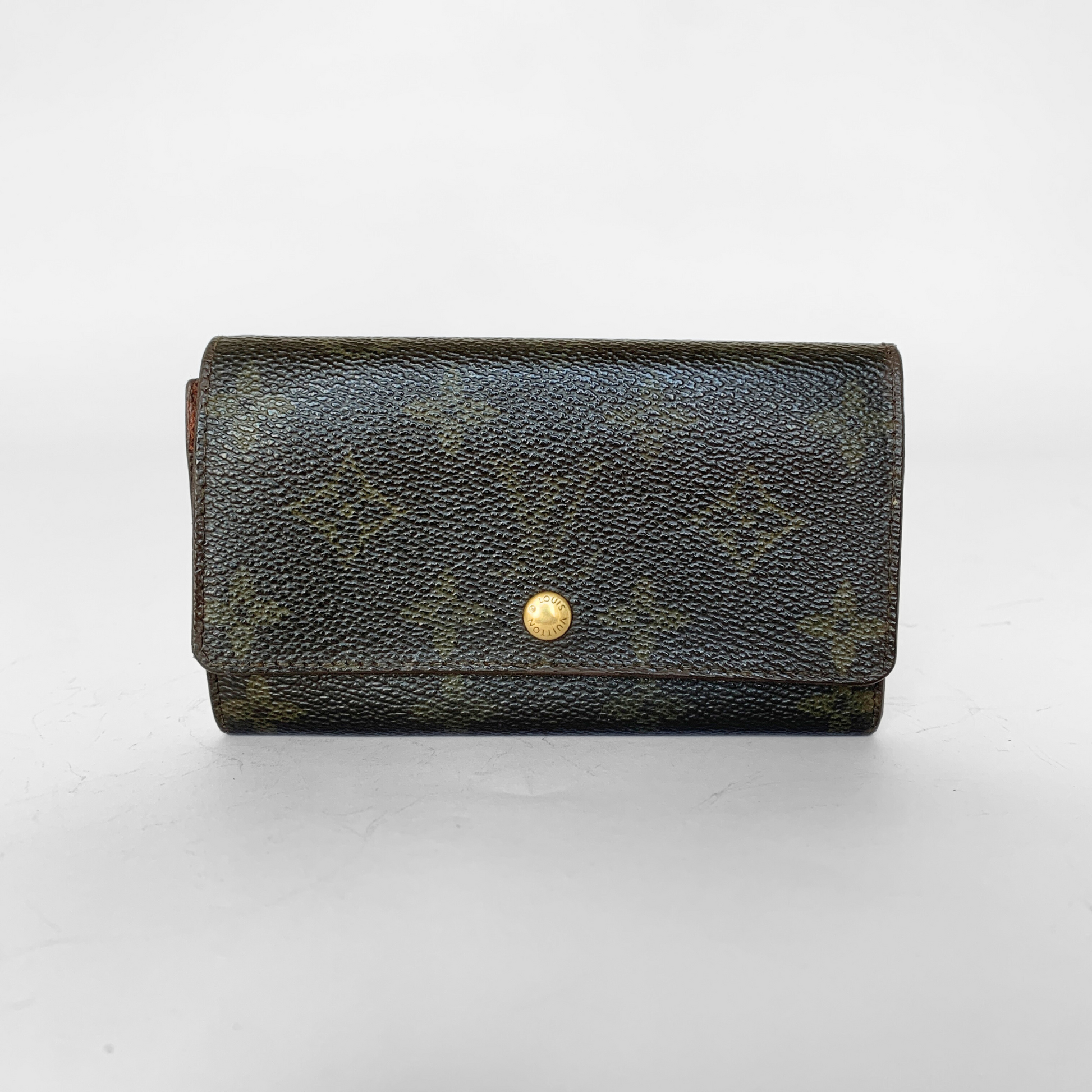 Black leather wallet with a gold button on a white background