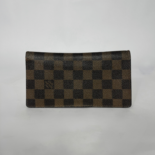 Brown checkered wallet on a white background