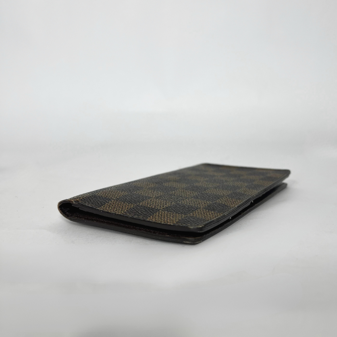 Checkered wallet on a light gray background