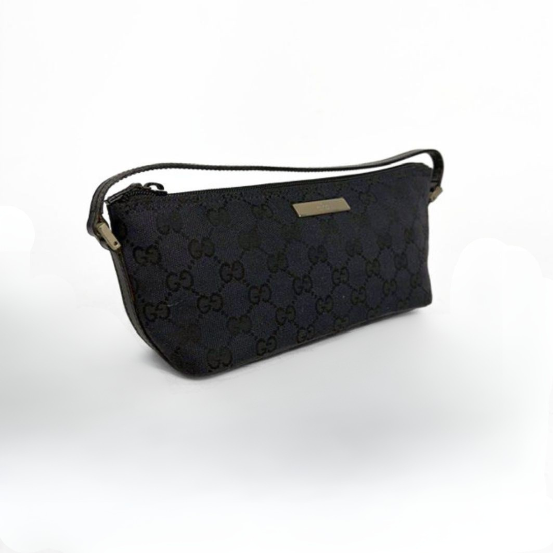 Gucci Boat Pochette in Canvas with the classic Gucci print on a white background
