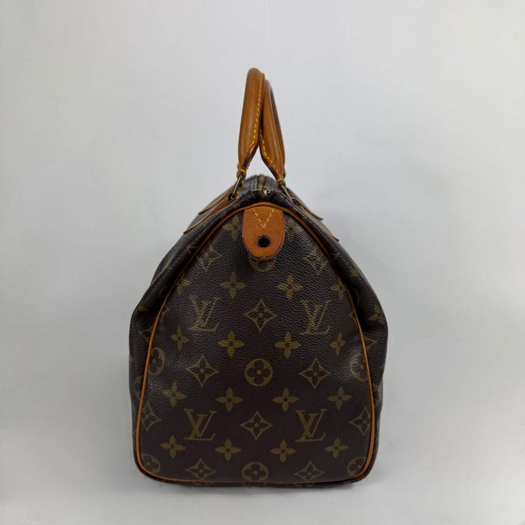 Louis Vuitton Speedy 30 on a white background