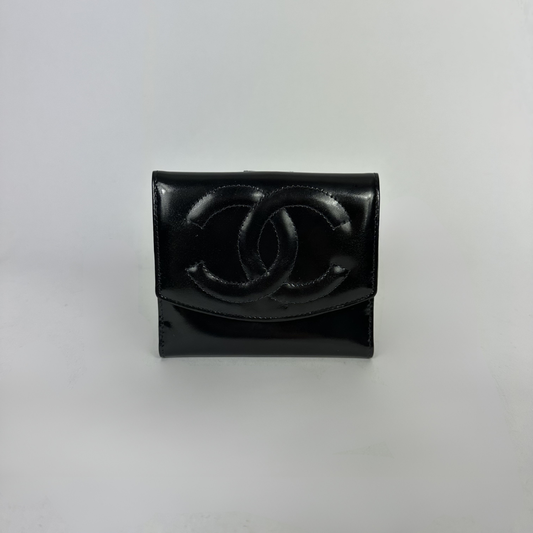 Black Chanel wallet on white background