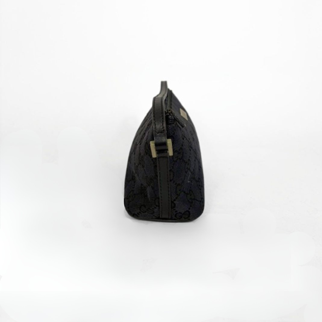 Gucci Boat Pochette in Canvas with the classic Gucci print on a white background