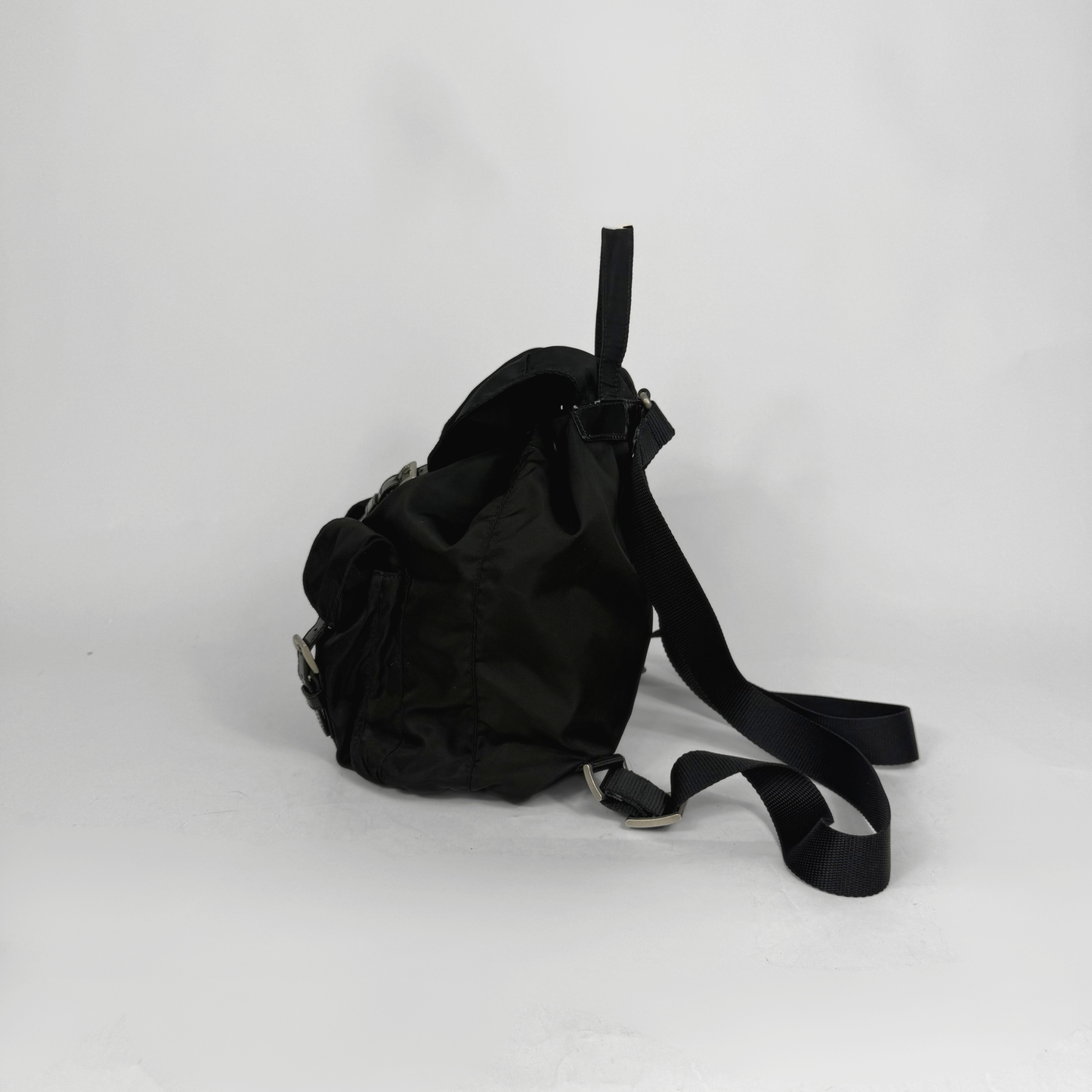 Black backpack on a white background