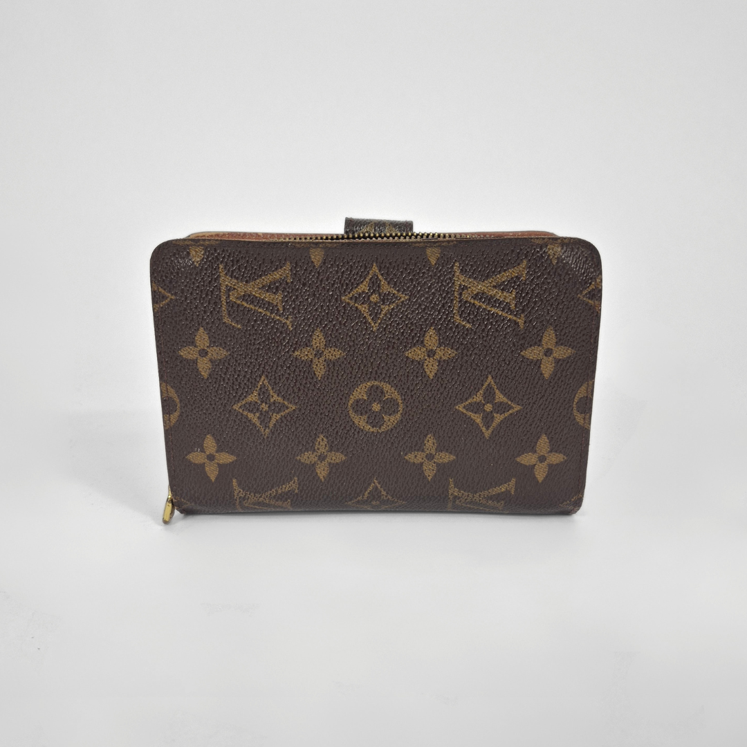 Brown wallet with gold monogram pattern on a white background