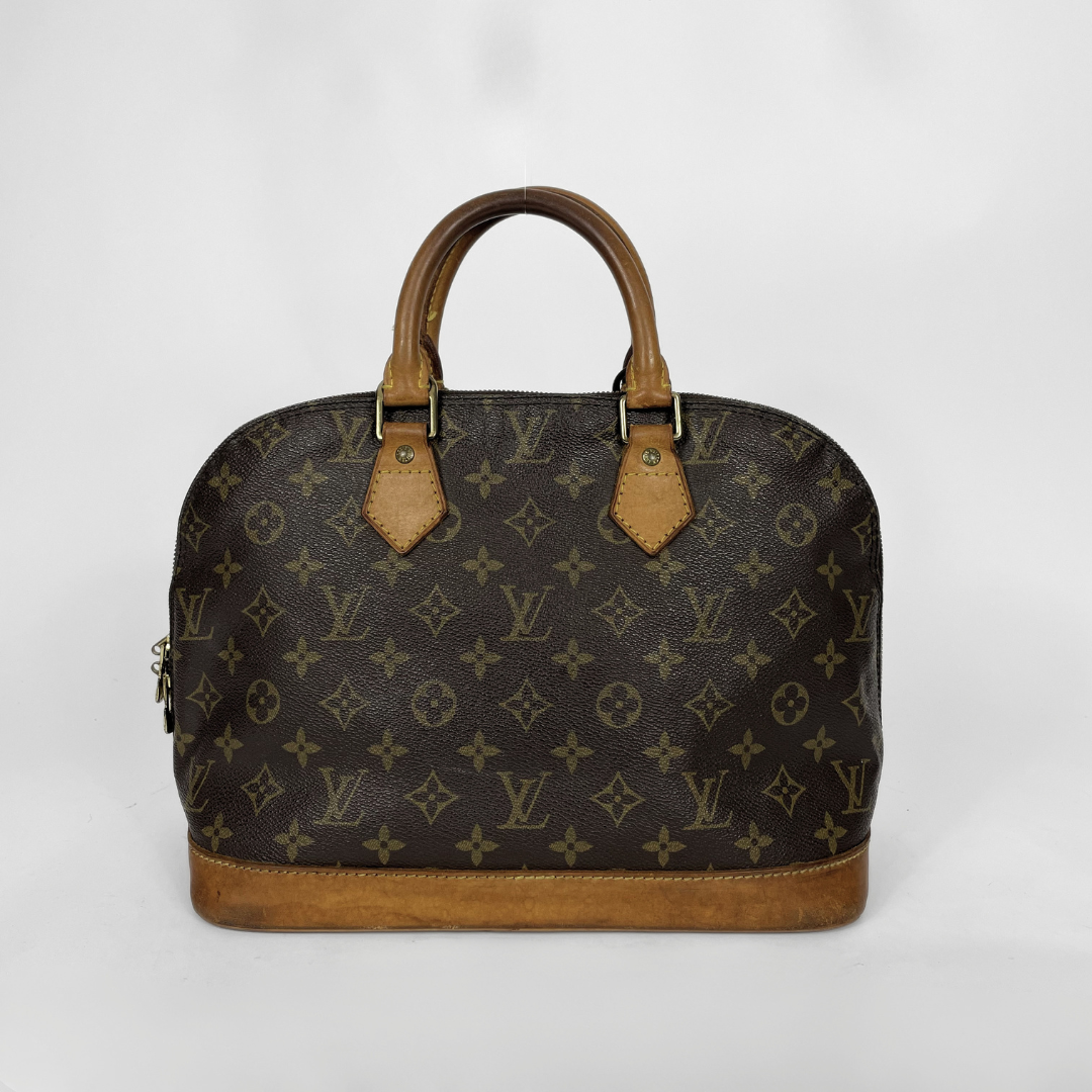 Louis Vuitton Alma Monogram Canvas on a white background