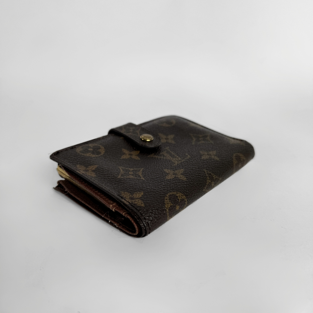 Louis Vuitton Druk Wallet on white background