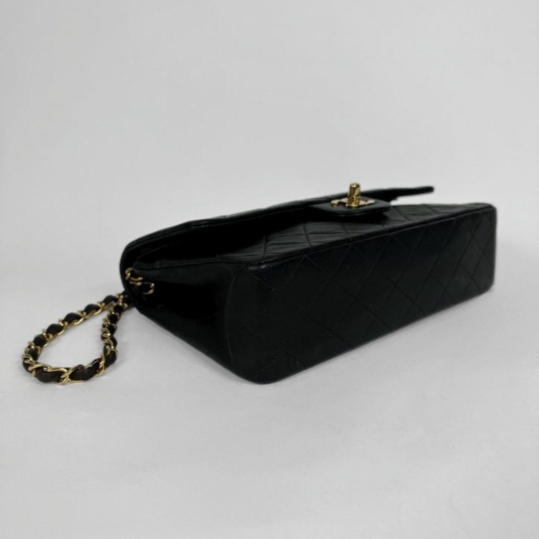 Chanel Medium Double Classic Flapbag on a light background
