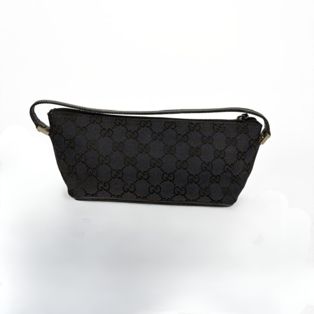 Gucci Boat Pochette in Canvas with the classic Gucci print on a white background