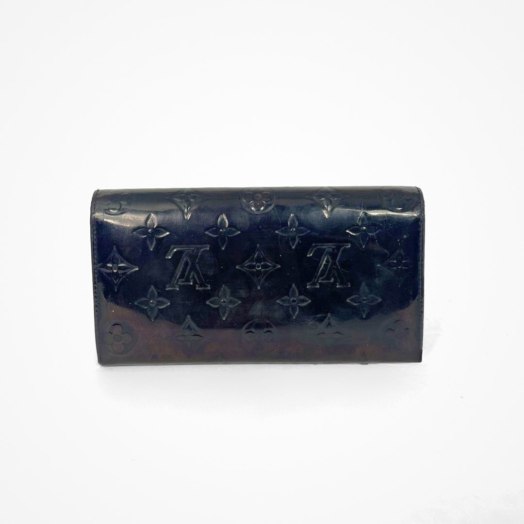 Louis Vuitton Vernis Wallet on a white background