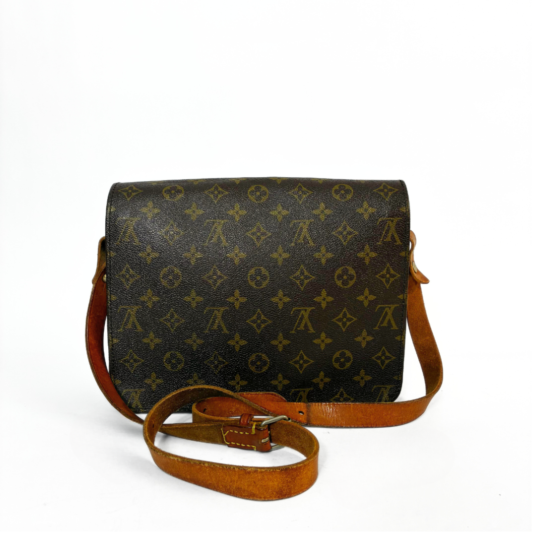 Louis Vuitton Cartouchière GM Monogram Canvas on a white background