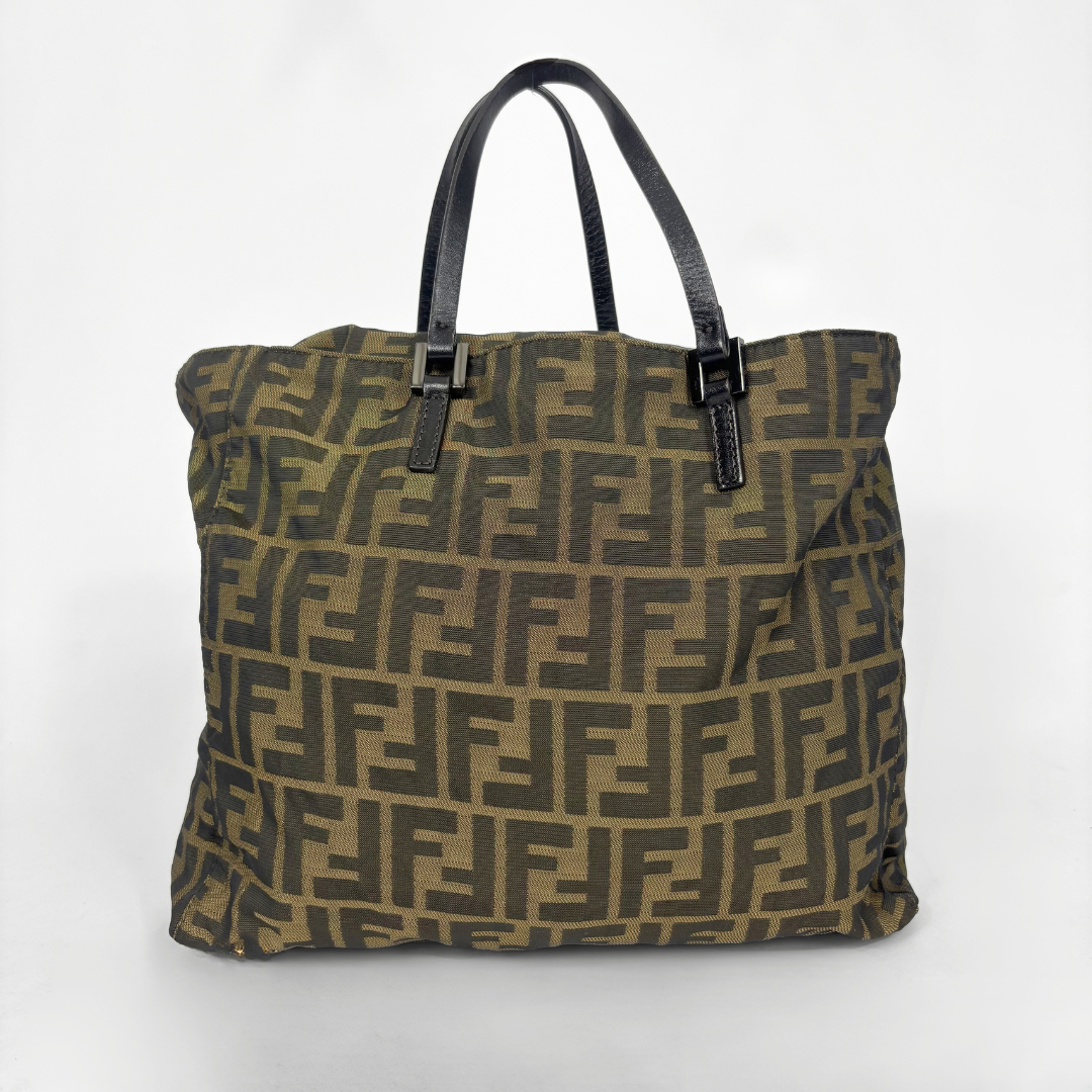 Fendi shopper bag in brown and black Zucca monogram canvas with black leather handles.