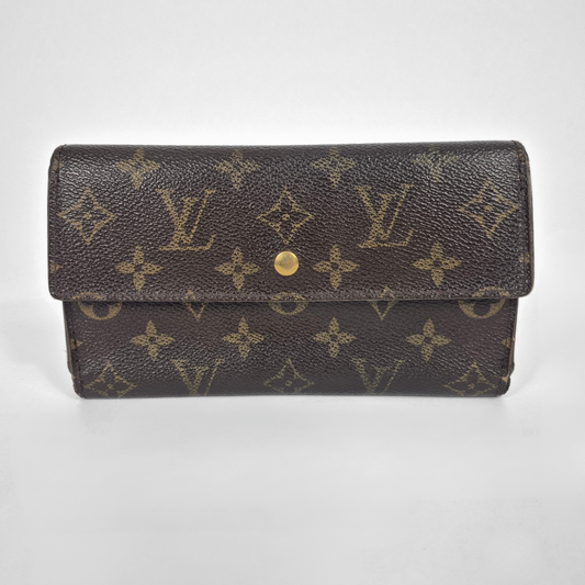 Brown wallet with monogram pattern on a white background