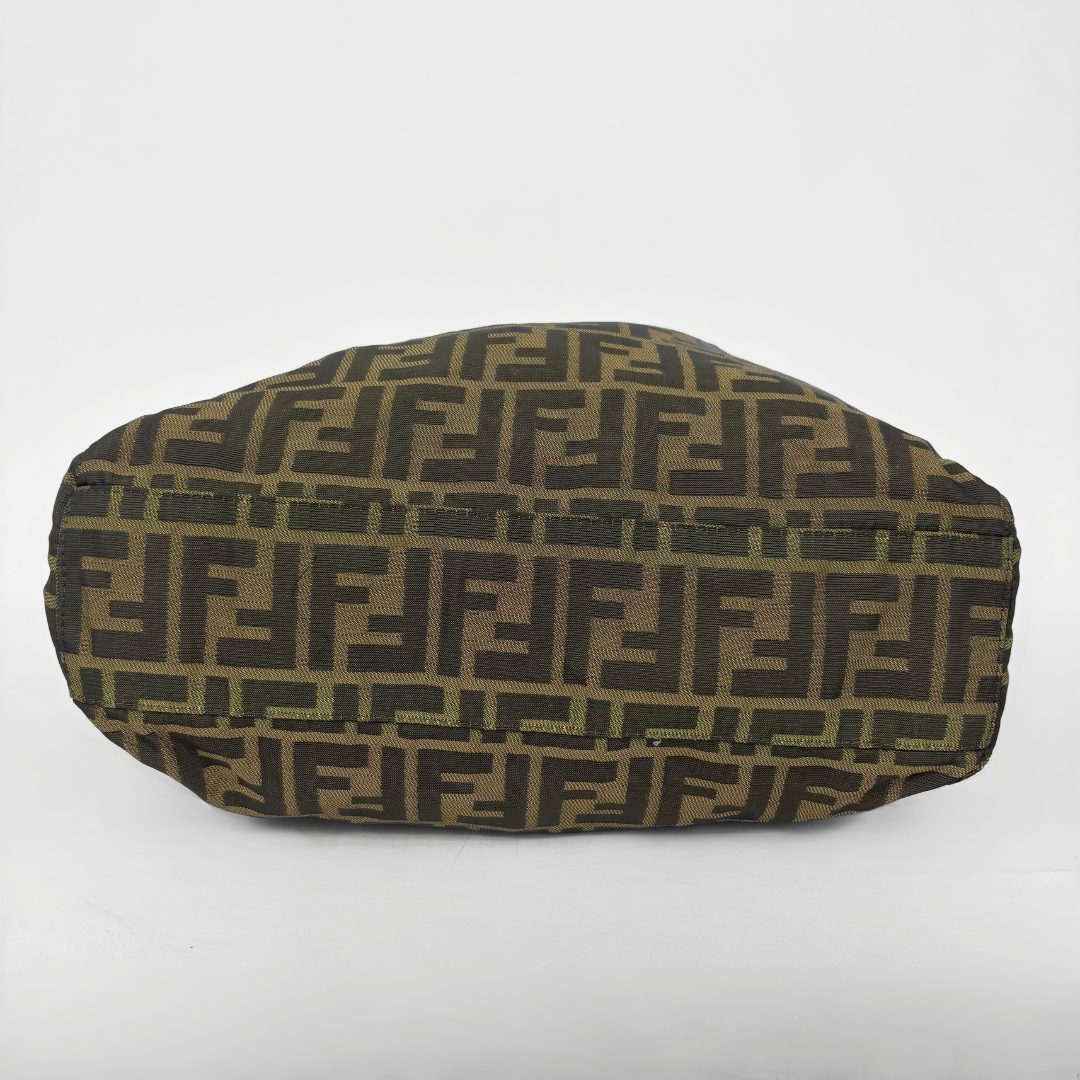 Fendi shopper bag in brown and black Zucca monogram canvas with black leather handles.