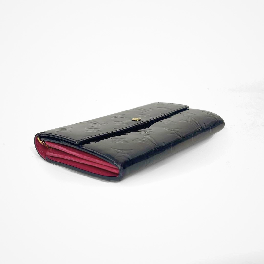 Louis Vuitton Vernis Wallet on a white background