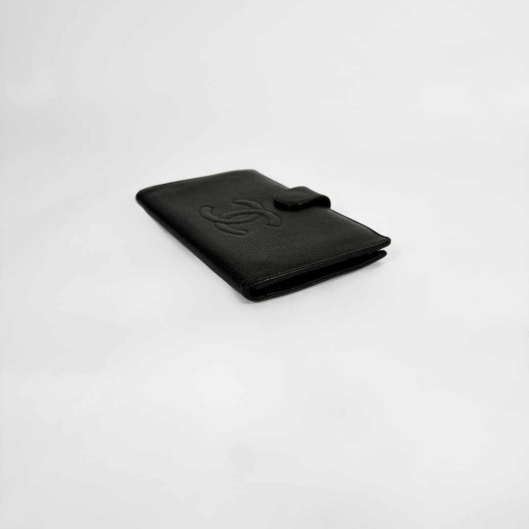 Chanel Wallet large Caviar on white background