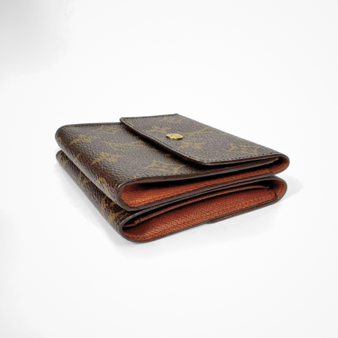 Louis Vuitton Druk Wallet on a white background