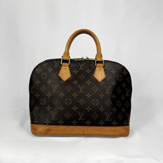 Louis Vuitton Alma Monogram Canvas on a white background